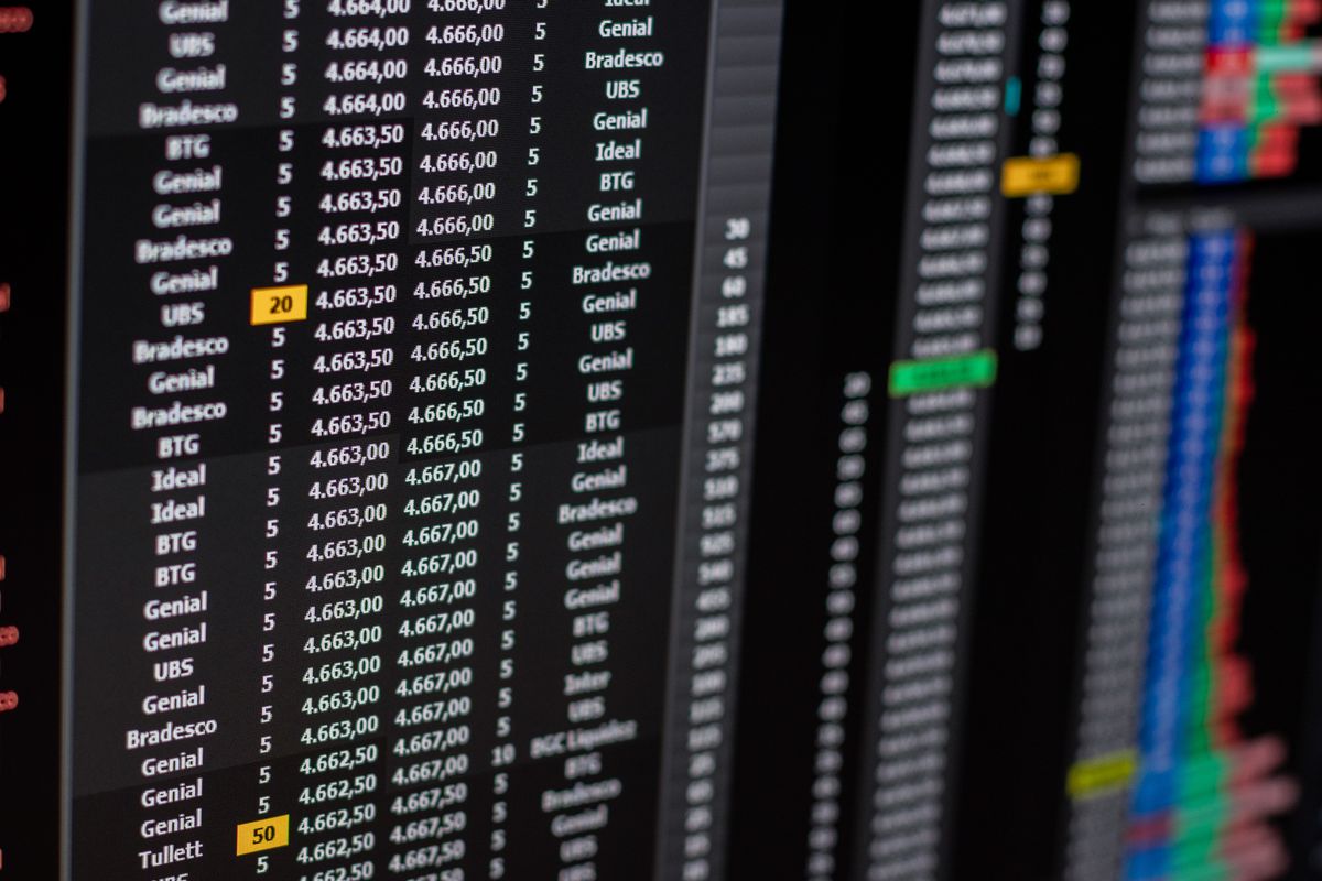 A dark monitor dense with live market numbers